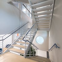 Guardrail mounted handrail